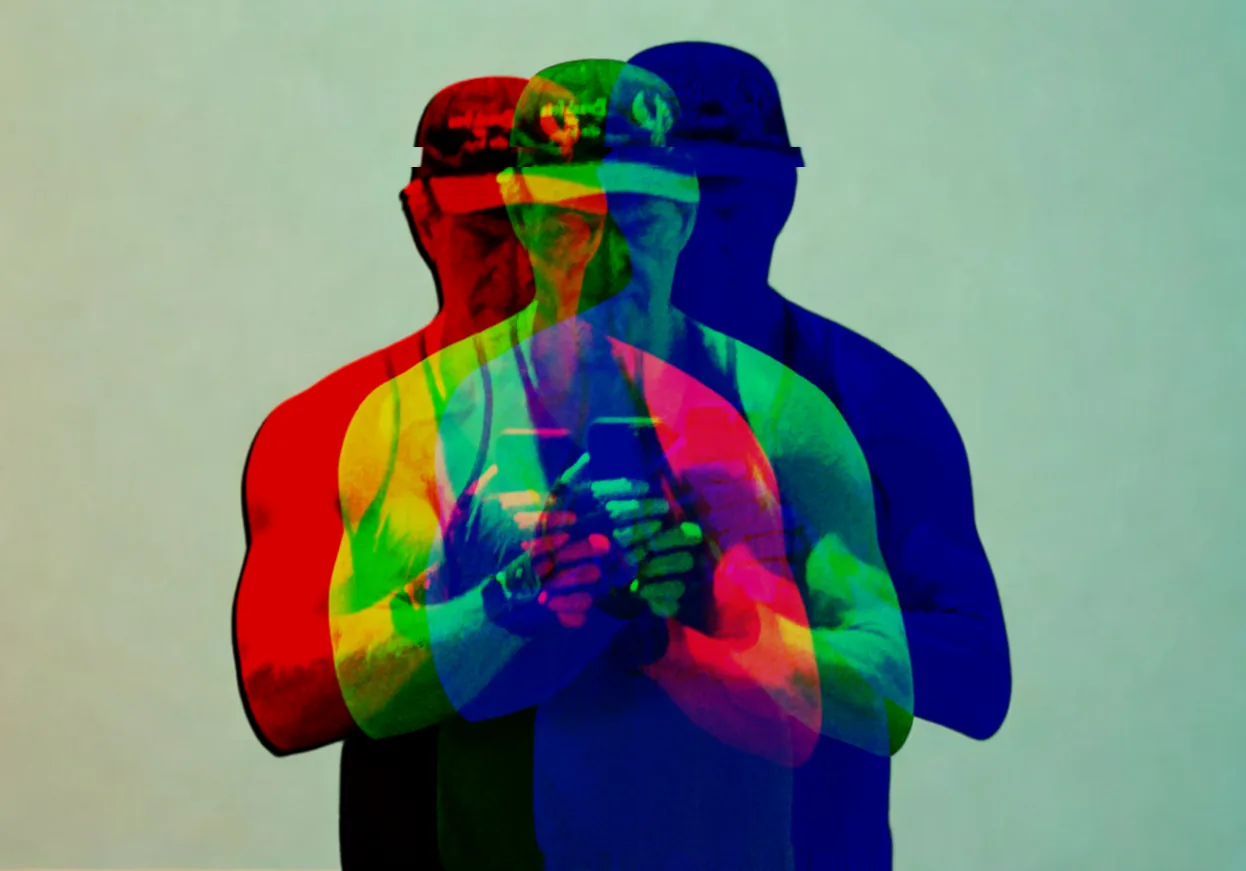 A colorful silhouette of a man holding a cell phone
